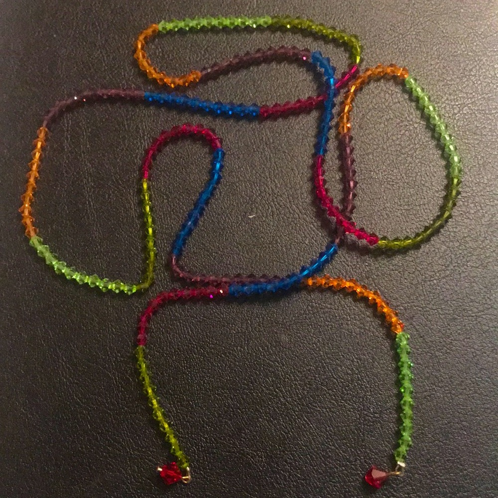 CRYSTALS ALL AROUND .. multi colored strand.. 36 inches